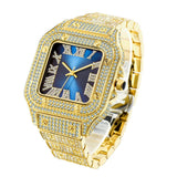 "Cartier Santos Uhr in Iced Out Gold mit blauem Zifferblatt - ein luxuriöses Statement für anspruchsvolle Uhrenliebhaber" "Goldene Cartier Santos Uhr mit blauem Zifferblatt und funkelndem Diamantbesatz - ein Symbol für Eleganz und Raffinesse" "Iced Out Goldene Cartier Santos Uhr mit markantem blauem Zifferblatt - ein Meisterwerk der Uhrmacherkunst"