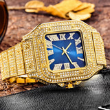 "Cartier Santos Uhr in Iced Out Gold mit blauem Zifferblatt - ein zeitloses Accessoire für stilbewusste Damen und Herren" "Goldene Cartier Santos Uhr mit blauem Zifferblatt und Diamantbesatz - ein Juwel am Handgelenk für besondere Anlässe"